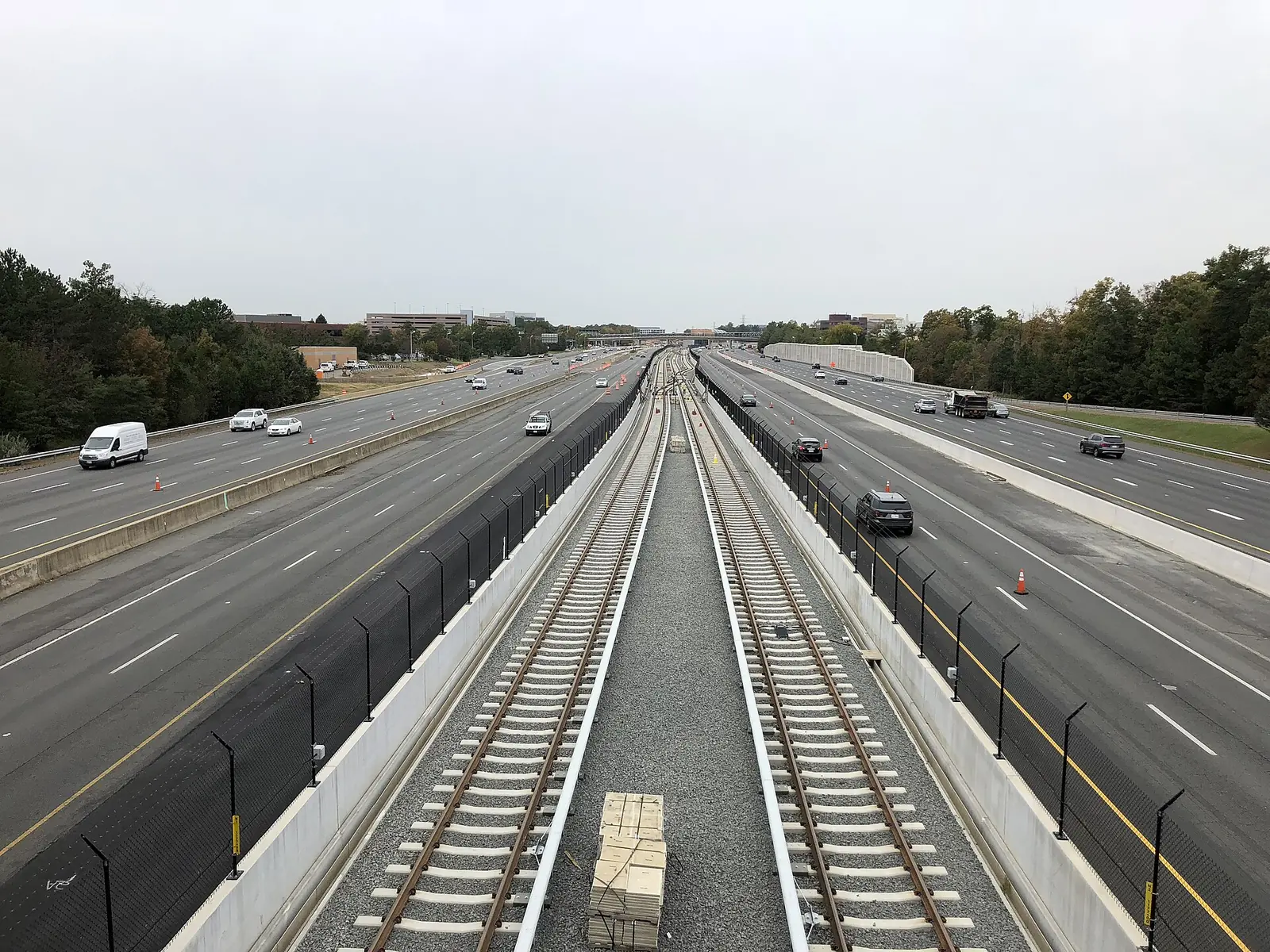 The Dulles Toll Road and the Metro Silver Line tracks in its median, looking west from the Fairfax County Parkway overpass in Reston