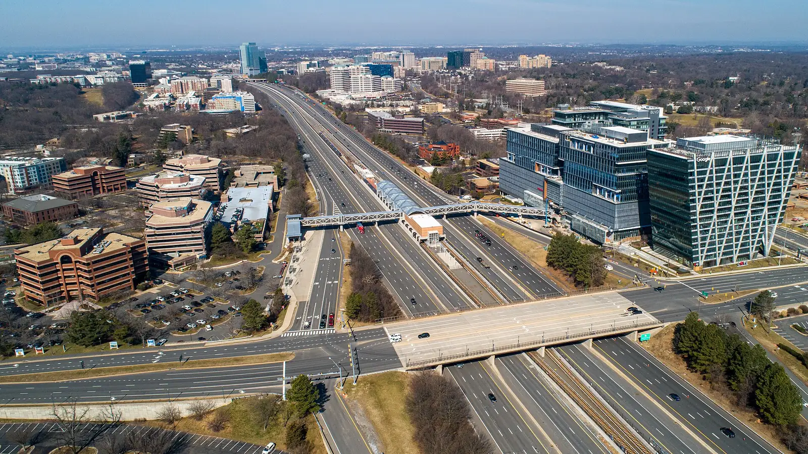 An aerial view west over Reston Station, the Dulles Toll Road and the Metro Silver Line in Reston