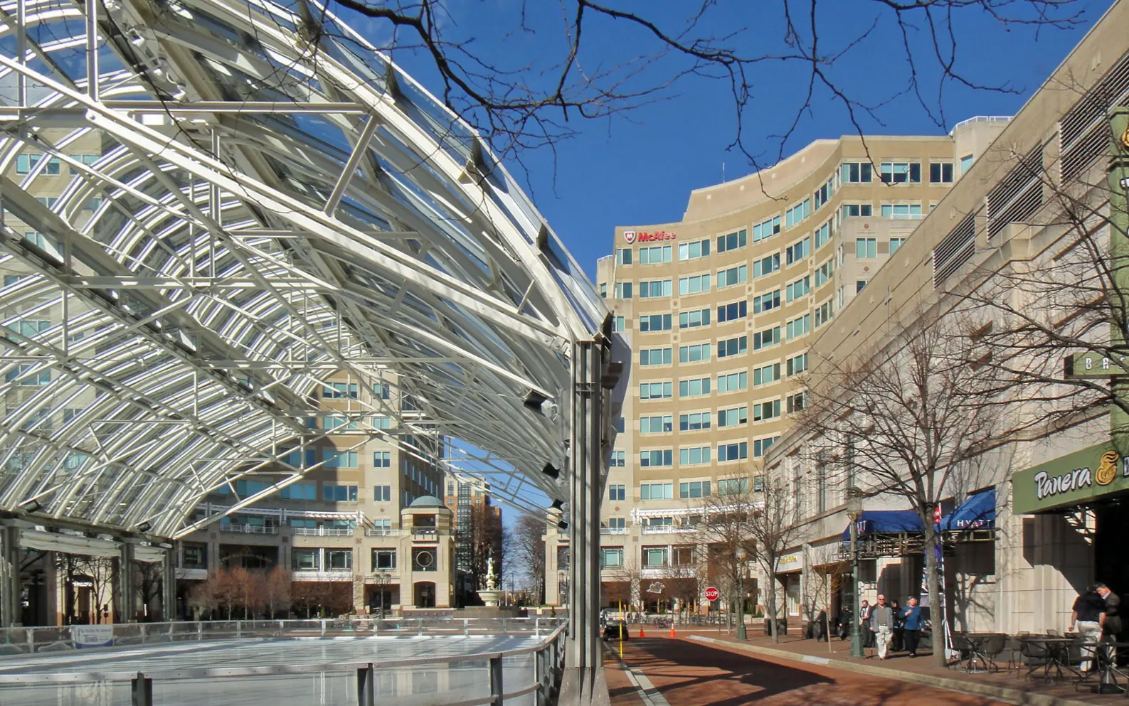 The glass Pavilion and storefront restaurants along Market Street at Reston Town Center